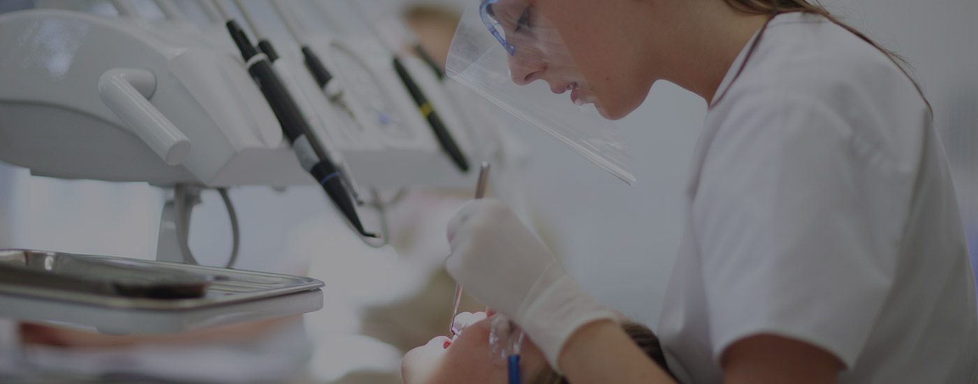 Dental technician working in lab